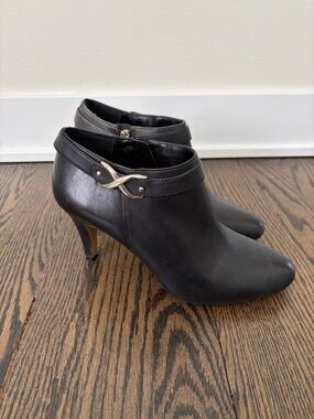Vince Camuto Black Leather Venida Ankle Booties with Decorative Metallic Buckle